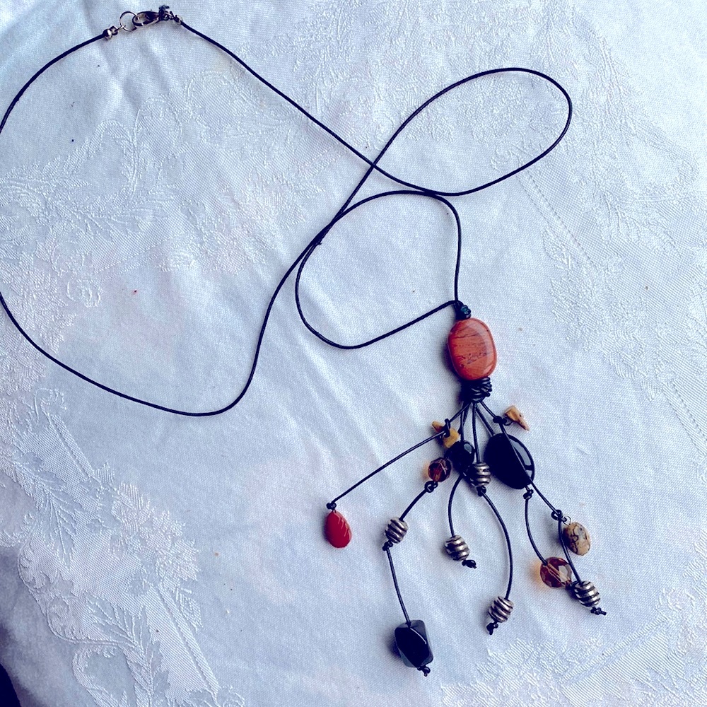 Gemstone, glass and silver toned lariat style, long length necklace.